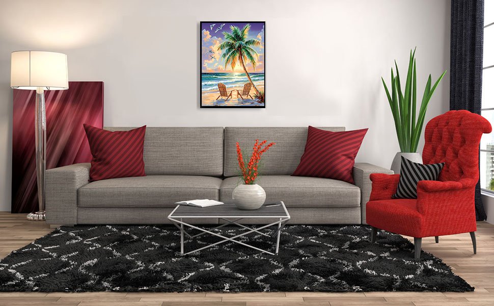 Living room scene with a diamond painting of a beach scene hanging above a sofa.