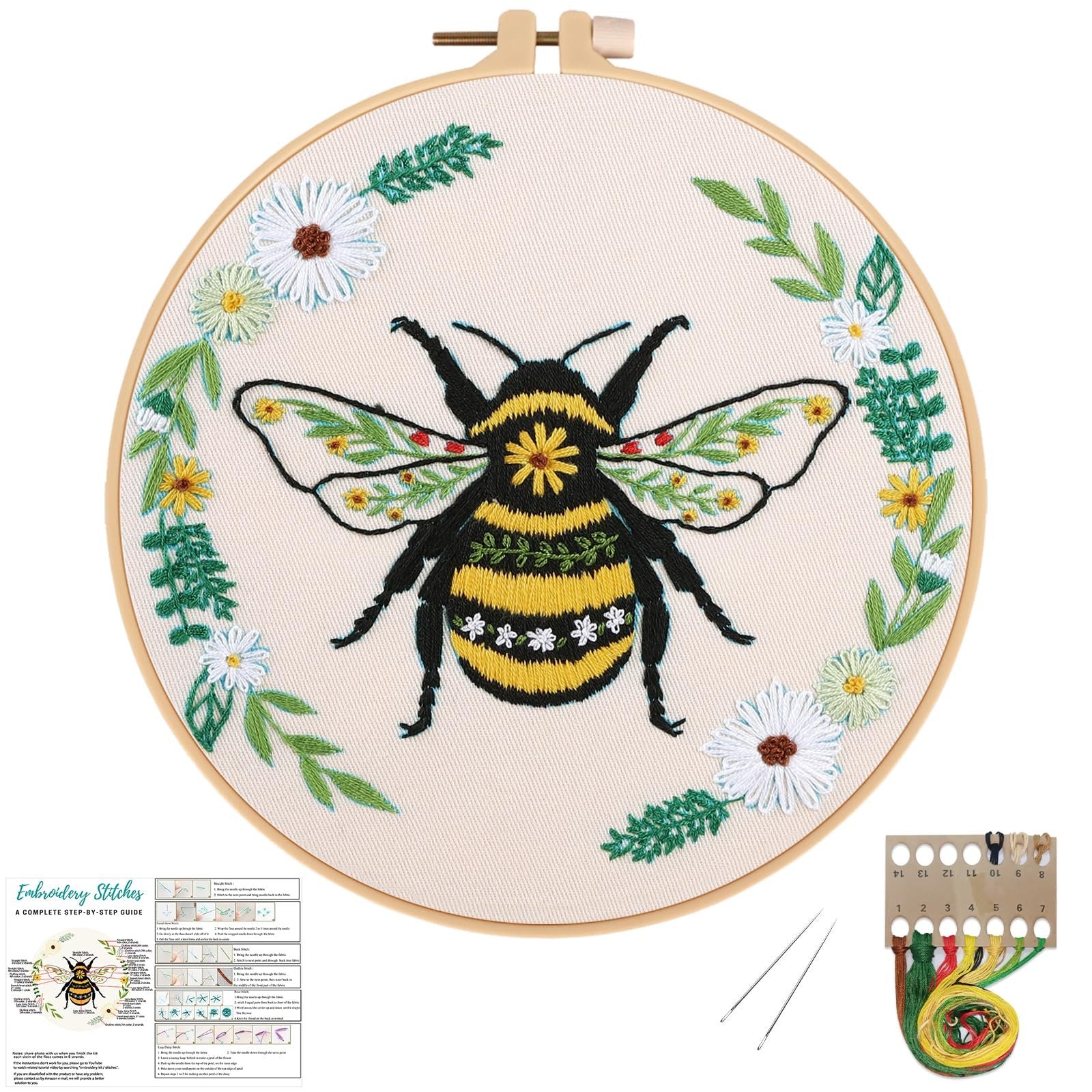 Embroidery hoop with a bee and floral design, includes instruction sheet and thread kit.