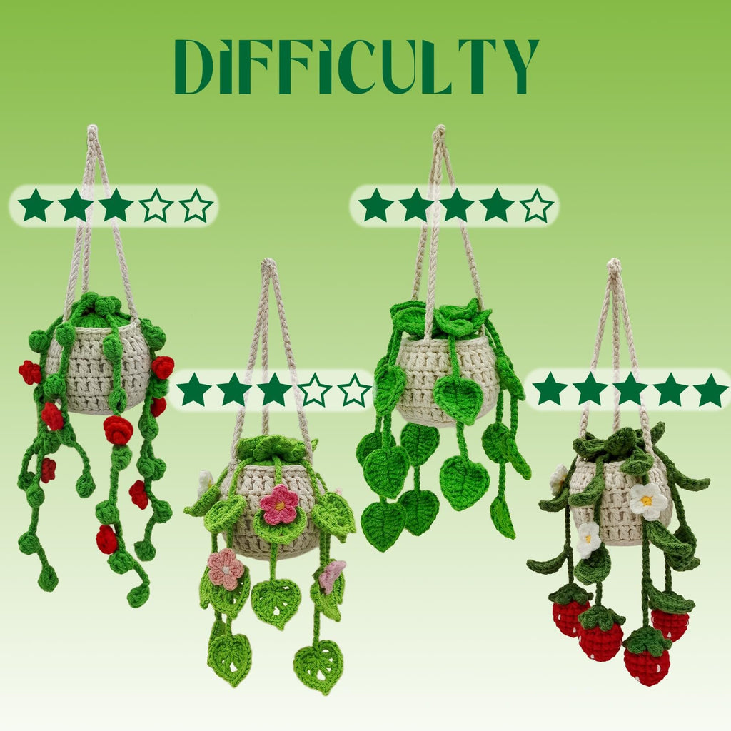 Four crocheted hanging plant holders with different decorative elements like flowers, leaves, and strawberries.