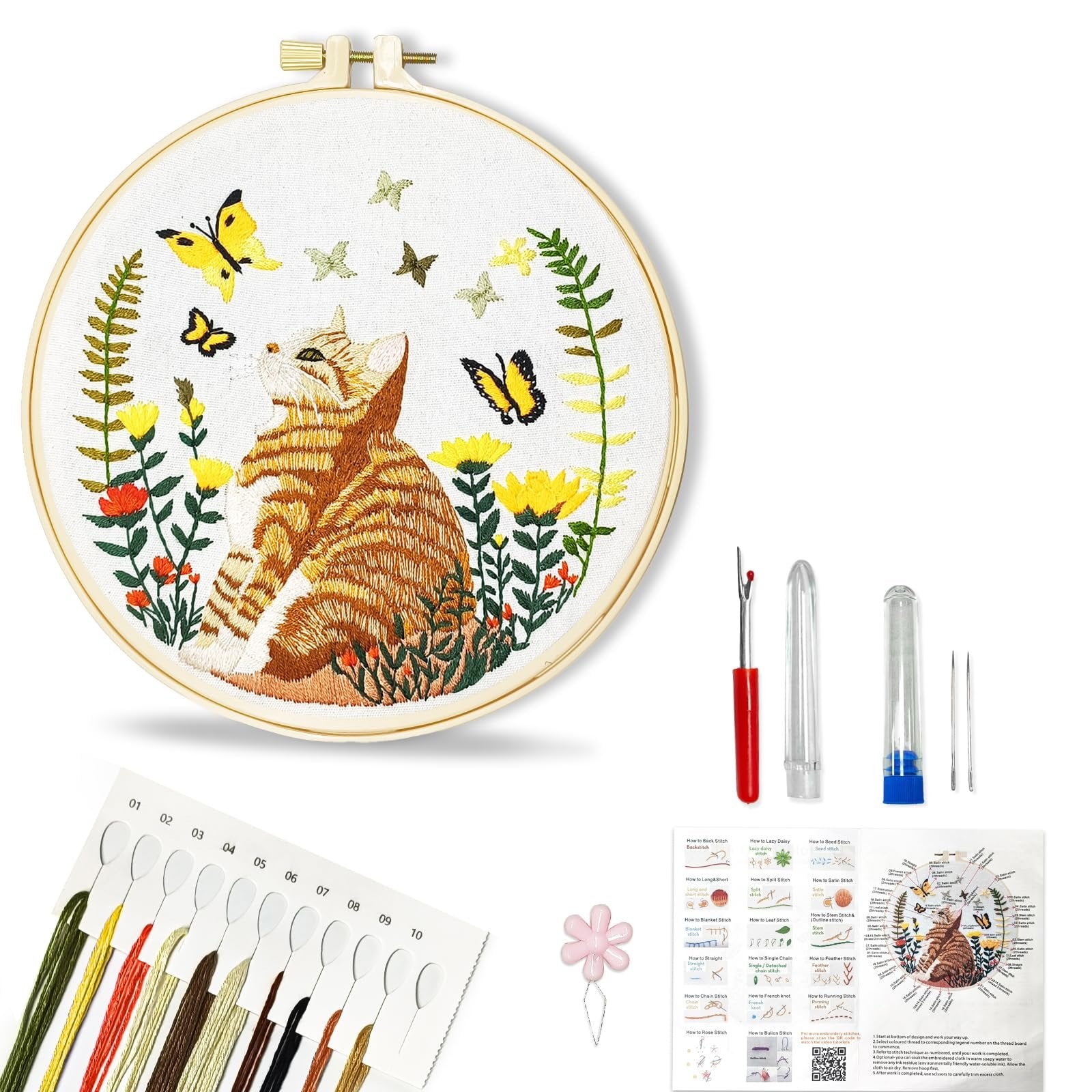 Embroidery kit with stamped cat pattern, hoop, threads, needles, seam ripper, and instructions.