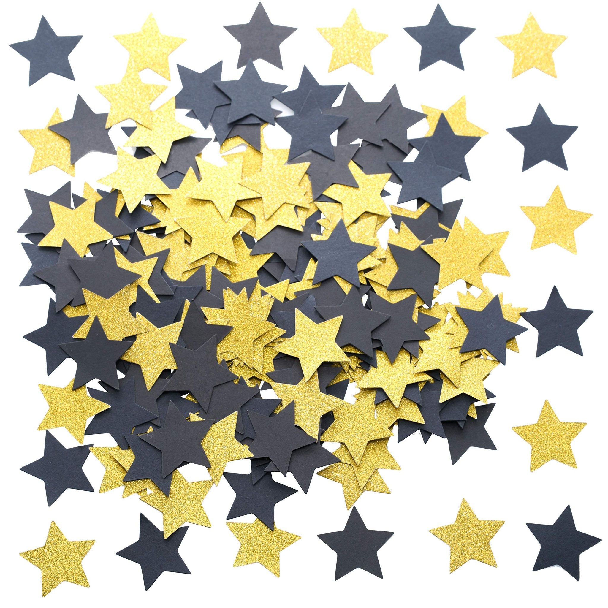 Pile of black and gold glitter star confetti scattered on a white background
