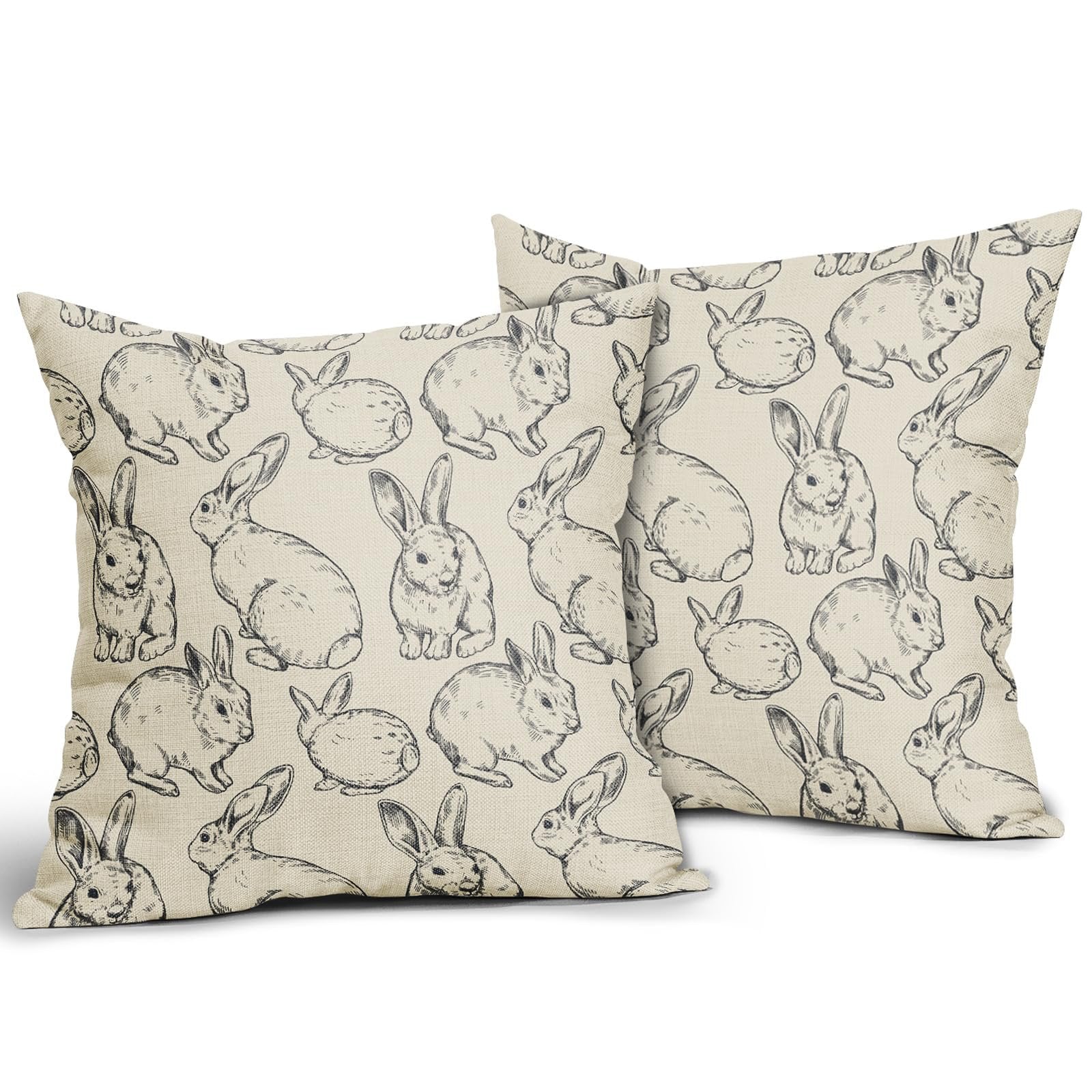 Two linen throw pillow covers with a black sketch pattern of various Easter bunnies on a white background.