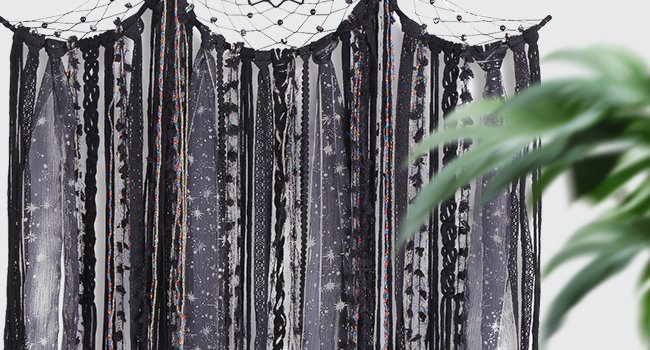 Black triple moon macrame wall hanging with mixed textile fringe and star pattern fabric