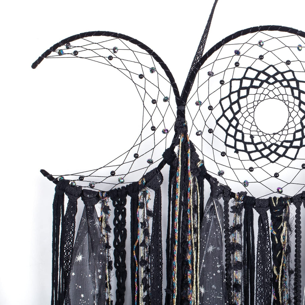 Black triple moon macrame wall hanging with mixed textile fringe and beads, close-up detail.