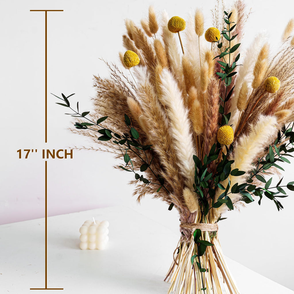 Boho dried flower bouquet with pampas grass, bunny tails, eucalyptus, and craspedia, with a 17-inch height indicator and a bubble candle.