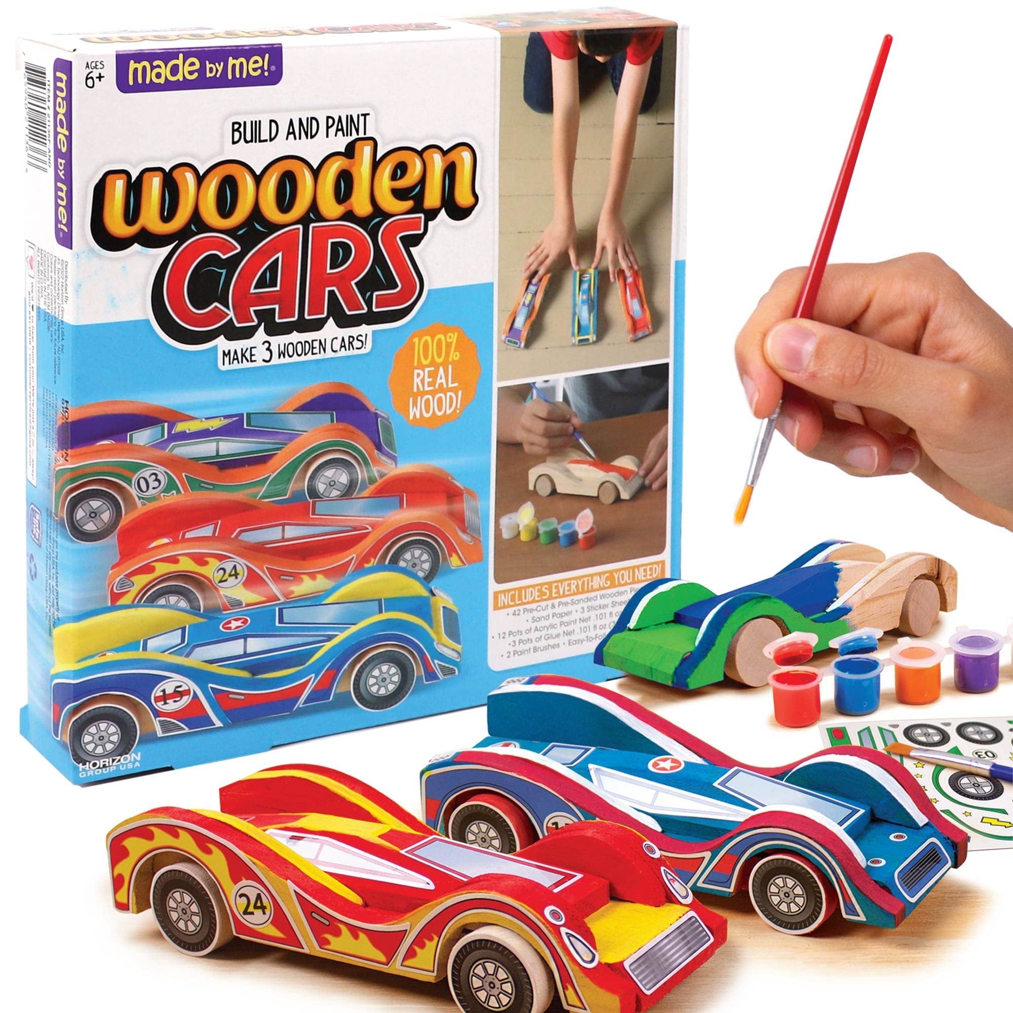 Build and Paint Wooden Cars craft kit with painted and unpainted wooden car models, paints, brushes, and stickers.