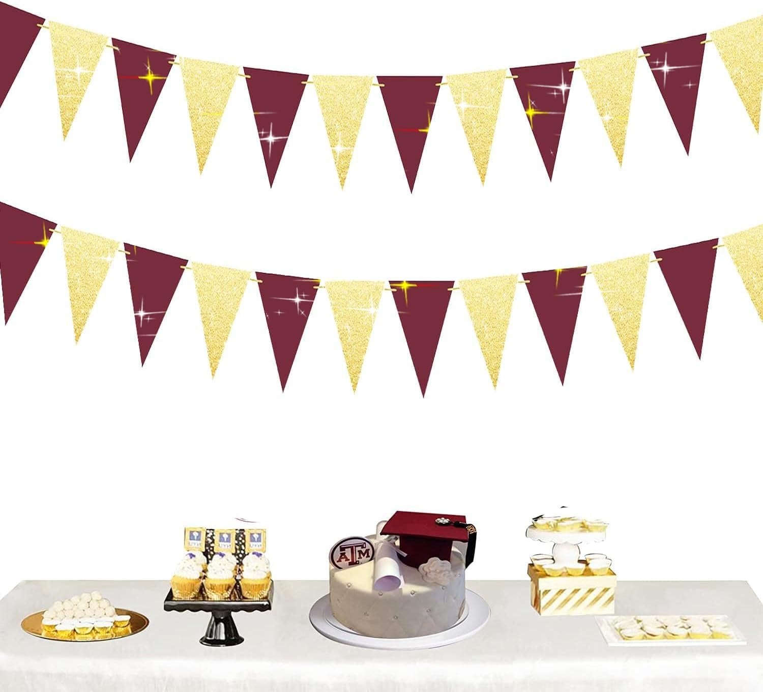 Burgundy and gold glitter triangle bunting garlands above a dessert table with a graduation cake and cupcakes.