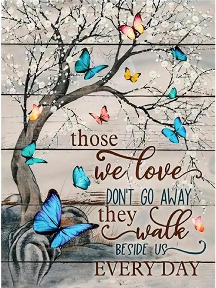 Stamped cross stitch kit with butterflies on a tree branch, featuring text about loved ones.