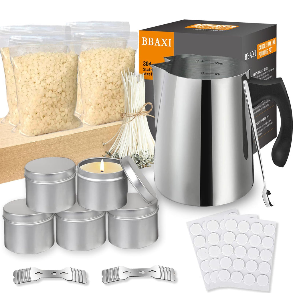 Candle making kit contents including a stainless steel pouring pot, bags of wax beads, wicks, tins, and stickers.