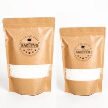 Two resealable kraft paper bags filled with white wax beads, each with a circular logo on top.