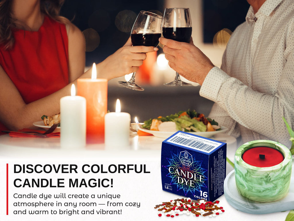 Couple toasting wine glasses at a candlelit dinner table with a box of candle dye and a finished candle.