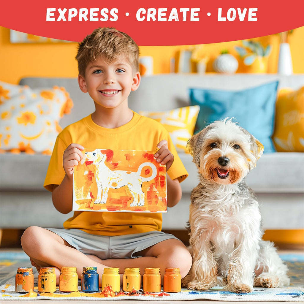 Smiling boy holding a painting of a dog next to a dog, with paint jars in foreground