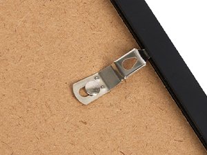 Close-up of the back of a black certificate frame showing a metal hanging clip attached to the backing board.