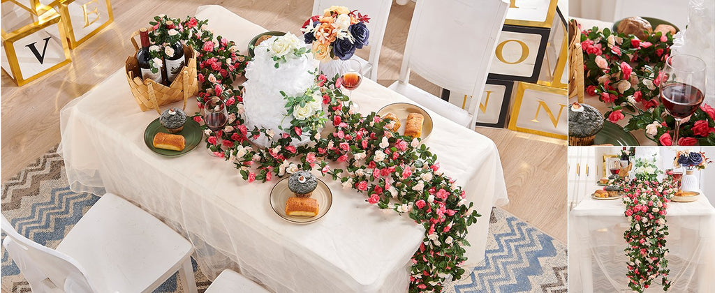 Table setting with champagne artificial rose vine garland, cupcakes, wine, and decorative blocks spelling 'LOVE'