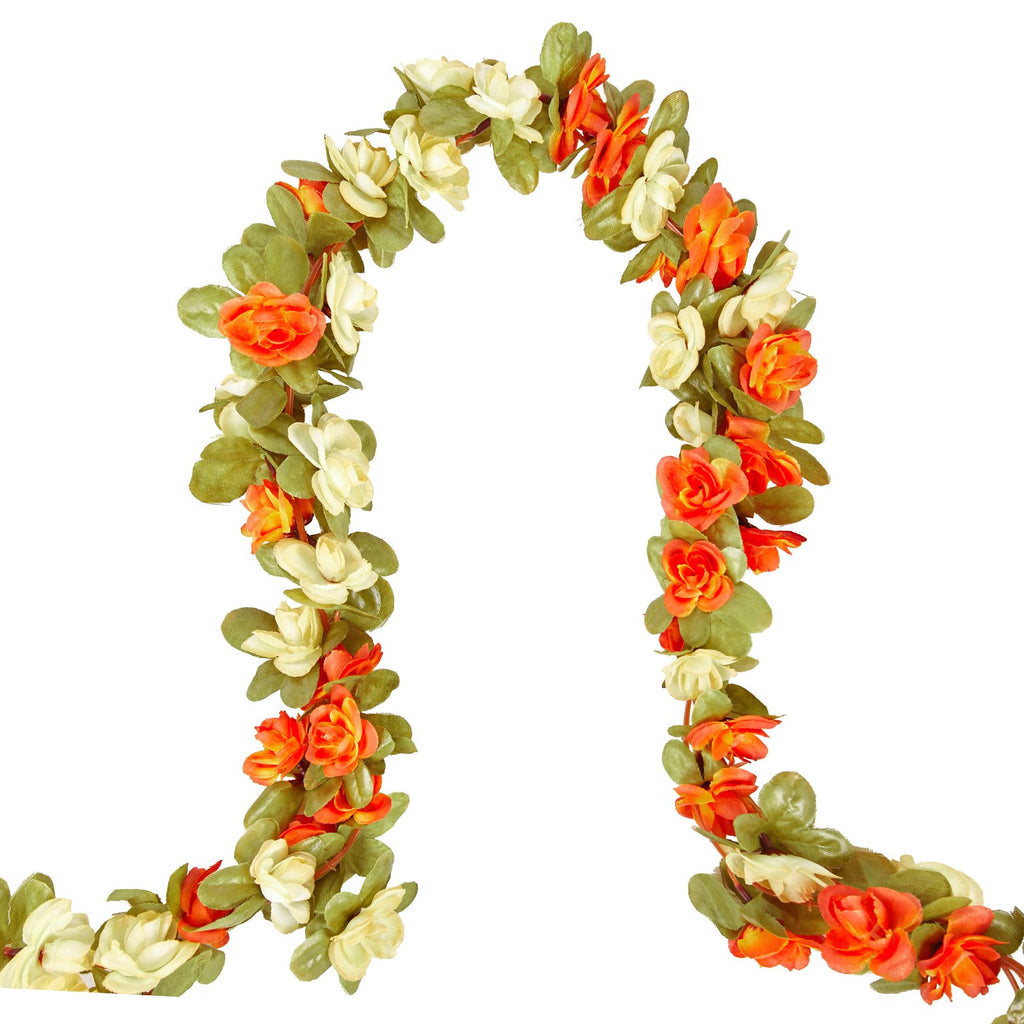 Artificial rose vine garland with orange and cream flowers and green leaves, displayed in an arch shape against a white background.