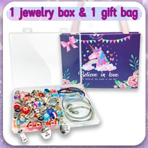 Charm bracelet making kit contents including beads, charms, and bracelets in an open box next to a gift bag with a unicorn design.