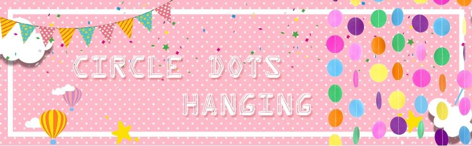 Pink background with white polka dots, featuring colorful circle dot garlands, bunting, hot air balloons, and confetti.