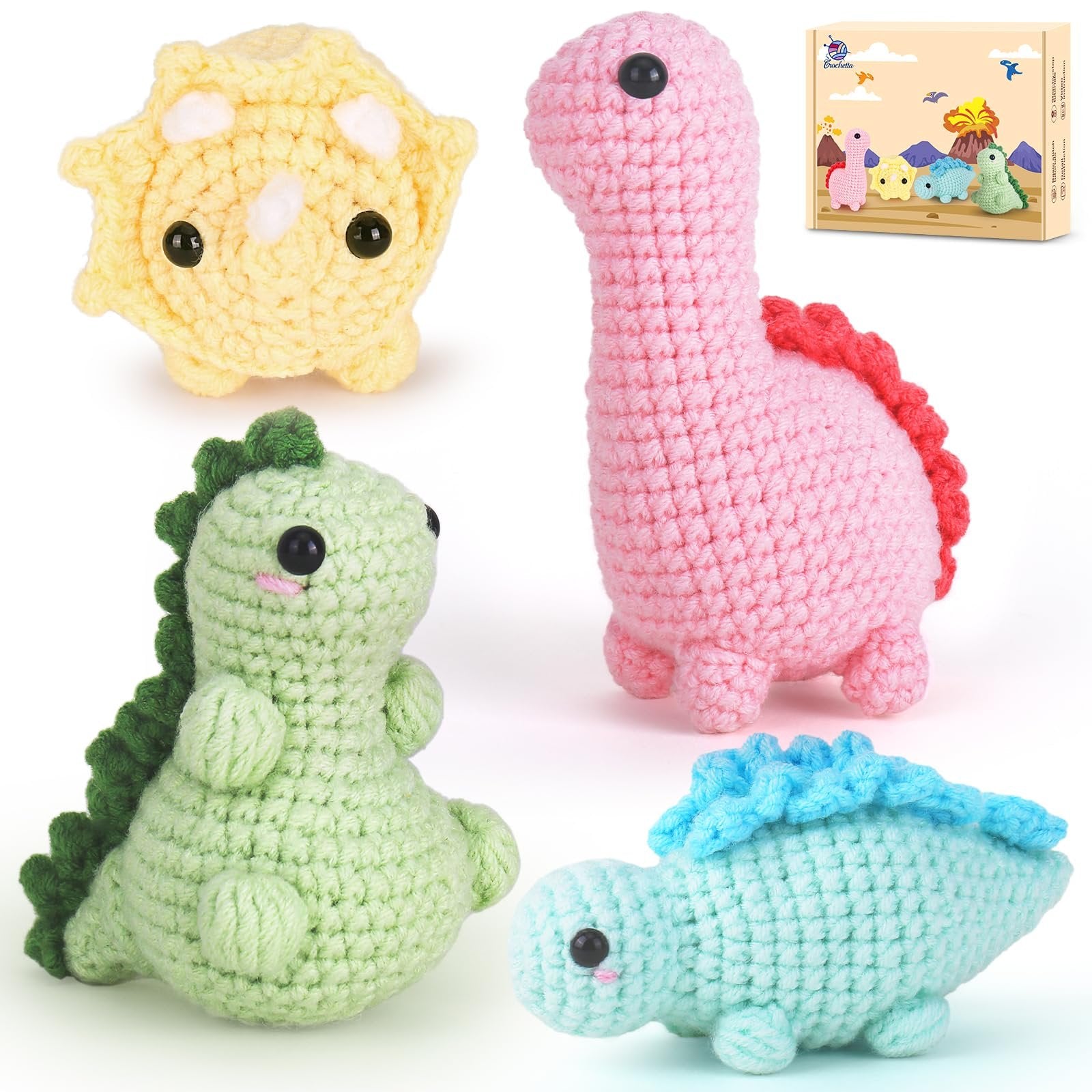 Four crocheted dinosaur toys in various colors, including pink, green, yellow, and blue, with a small box in the background showing illustrations of the toys.