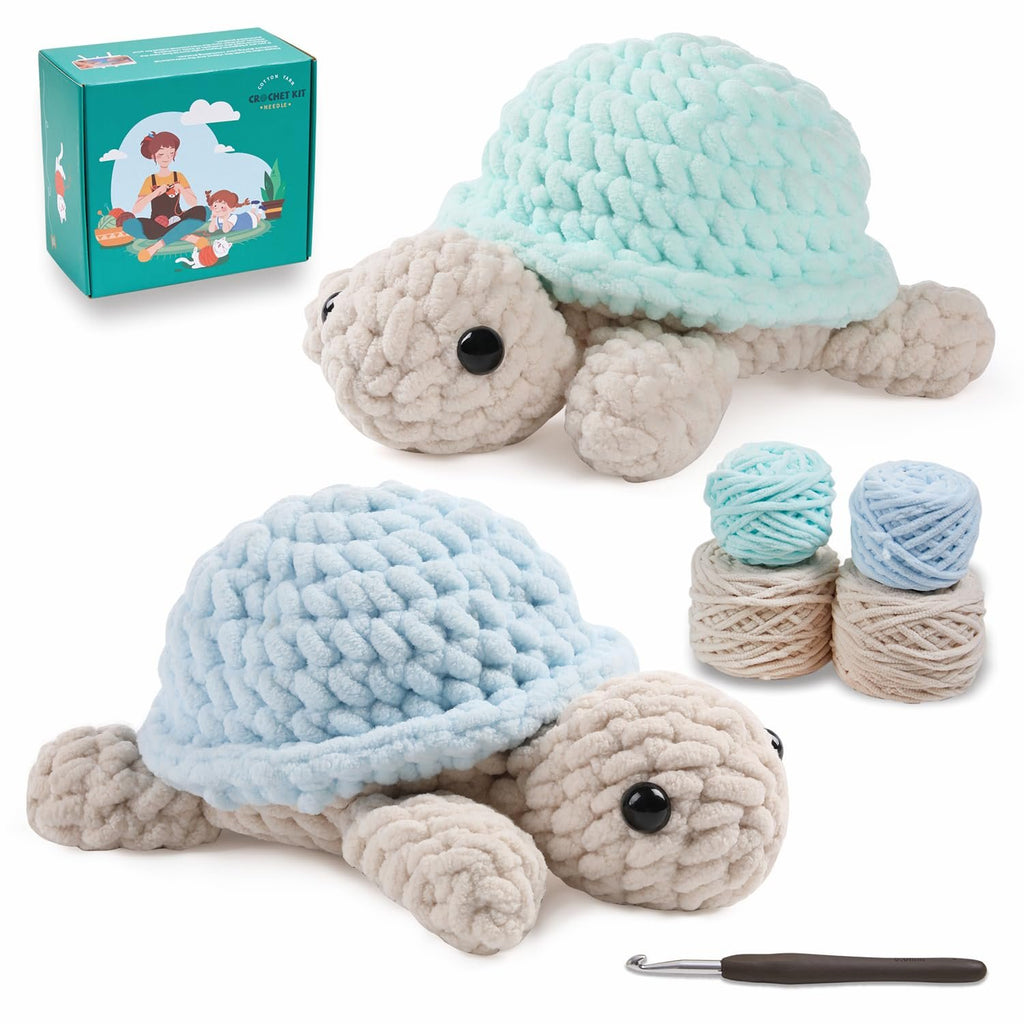 Two plush crochet turtles, one light blue and one teal, with yarn balls and a crochet hook on a white background.