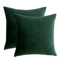 Two dark green velvet throw pillow covers shown from the front on a white background.