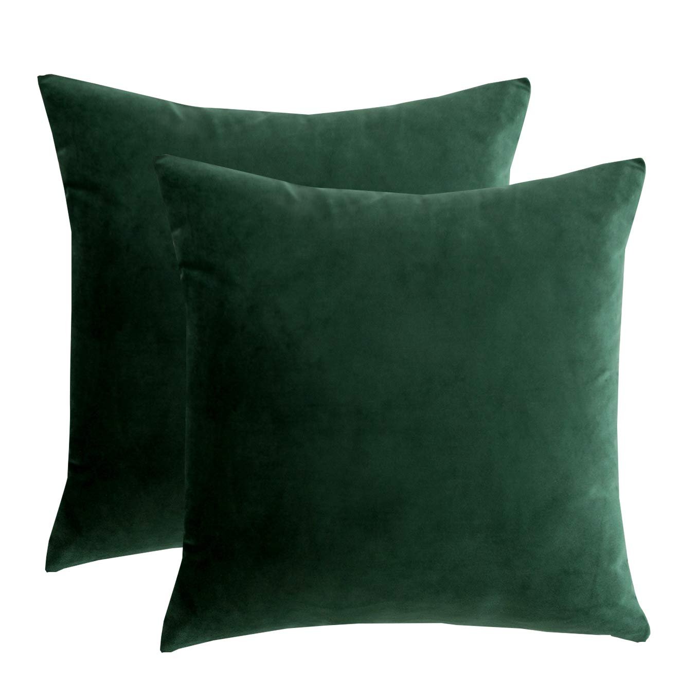 Two dark green velvet throw pillow covers shown from the front on a white background.