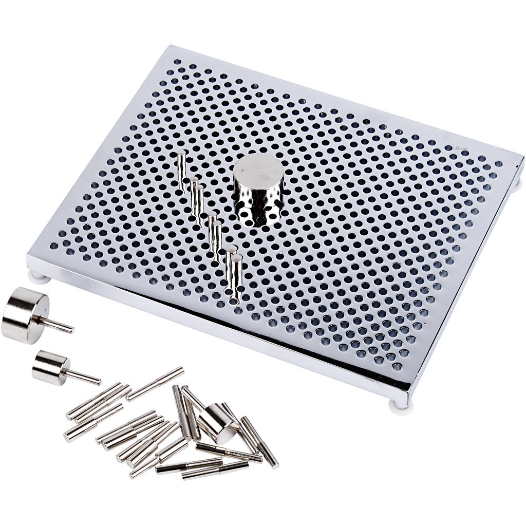 Aluminum wire jig kit with adjustable pegs and patterns for jewelry making, shown on a white background.