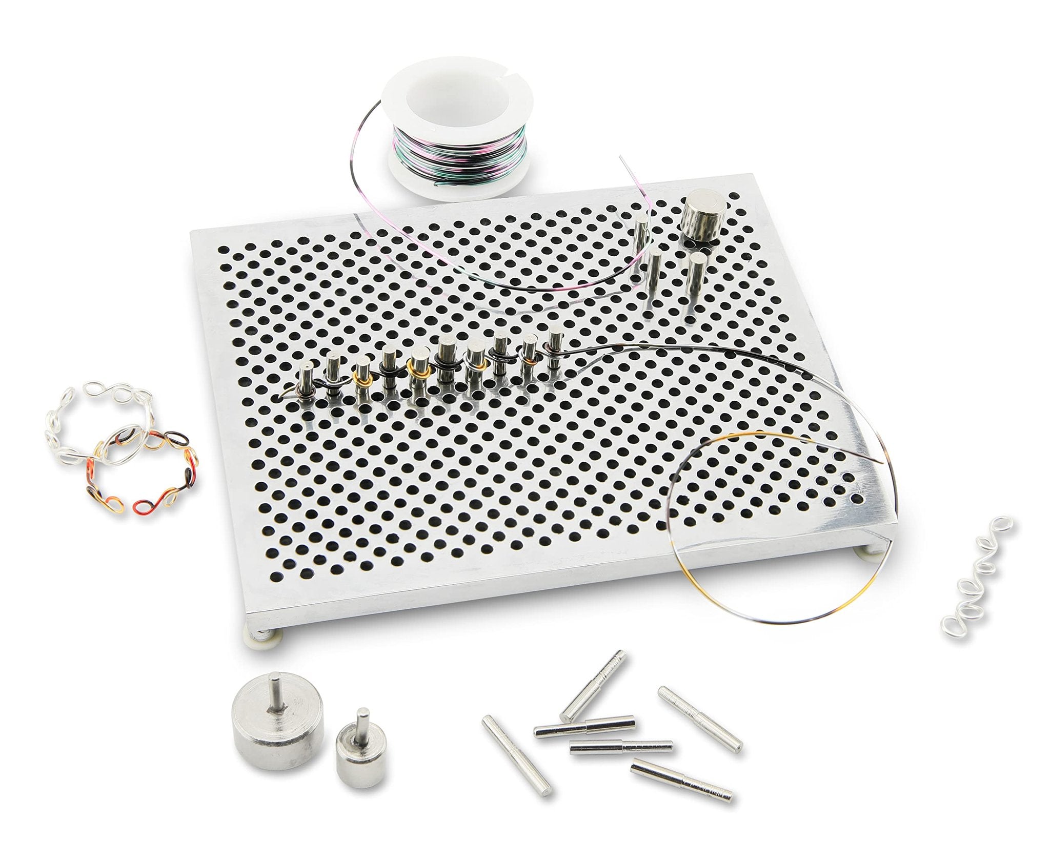 Jewelry making wire jig kit with adjustable pegs, wire spool, and sample wire shapes on a white background.