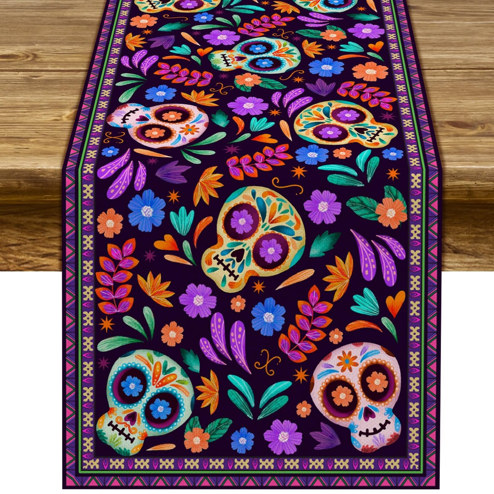 Dia De Los Muertos table runner with sugar skull and floral design on a wooden table