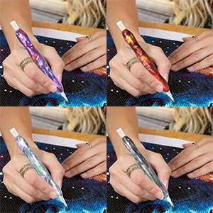 Four hands holding diamond painting drill pens with colorful marbled patterns, working on a diamond art canvas.