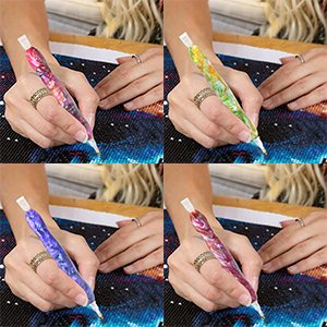 Four hands holding diamond painting drill pens with colorful marbled designs, working on a diamond art canvas.