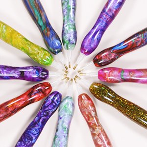 Diamond painting drill pens with replaceable tips arranged in a circle, showcasing colorful marbled and glitter designs.