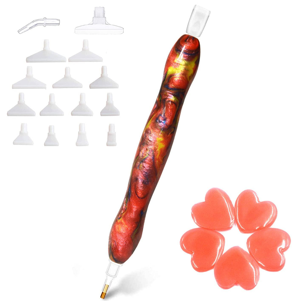 Diamond painting drill pen with multiple interchangeable tips and heart-shaped wax pieces on a white background.