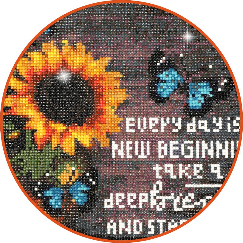 Diamond painting of a sunflower and butterflies with inspirational text.