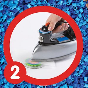 Hand ironing a fuse bead creation on parchment paper, with a large circle of blue beads in the background and a large number 2 graphic.