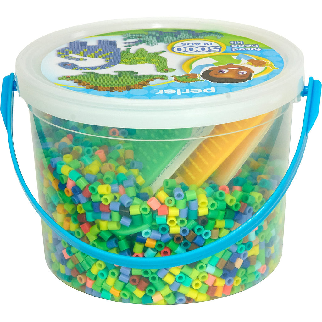 Clear bucket filled with colorful fuse beads, includes pegboards and yellow ironing paper.
