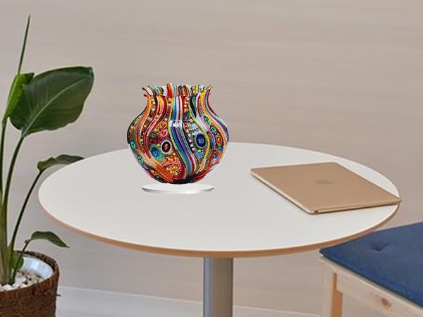 Colorful 5D diamond painting vase ornament on a white table with a plant and tablet