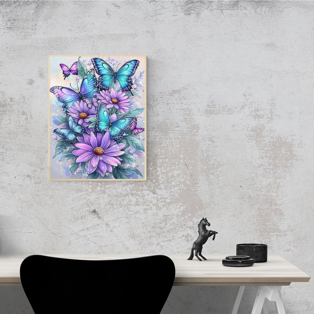 Diamond art painting of blue butterflies and purple flowers hanging on a textured wall.