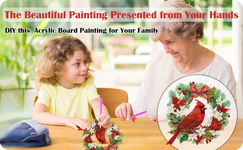 Grandmother and child doing a diamond art cardinal bird wreath kit at a table