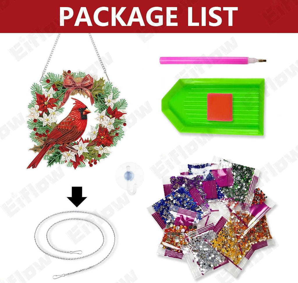 Diamond art cardinal bird wreath hanging ornament kit contents laid out, showing ornament, tools, and gem bags.