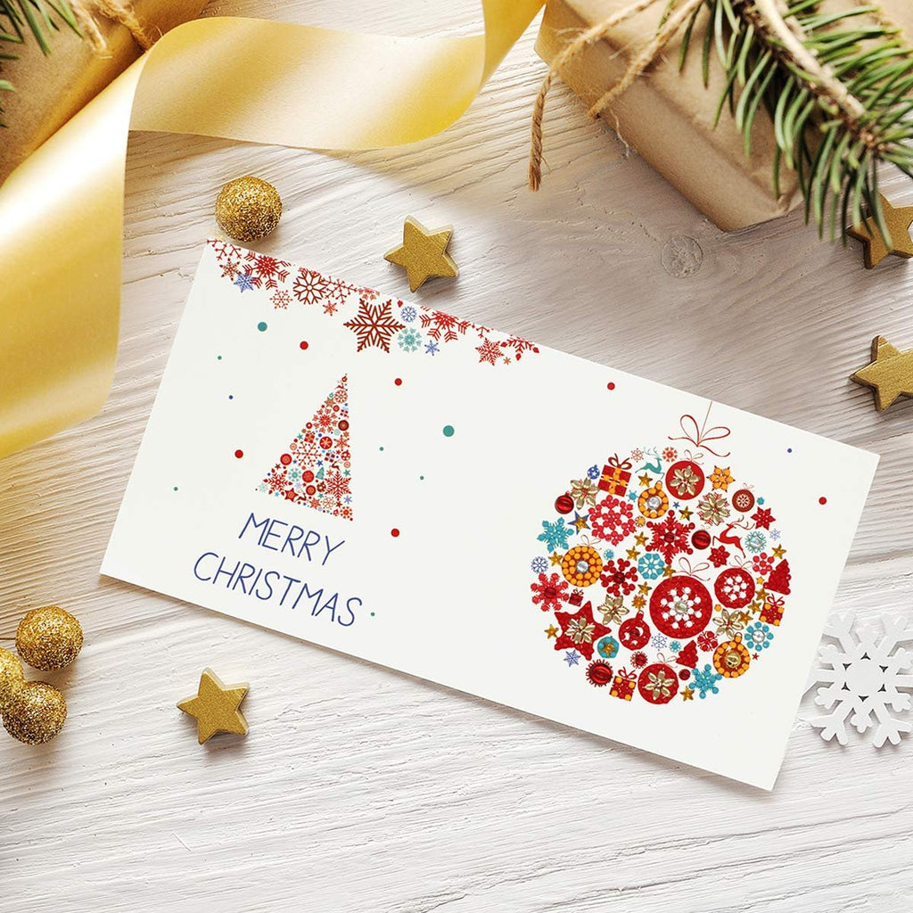 Christmas card with a decorated tree and ornament design, surrounded by festive decorations and gifts.