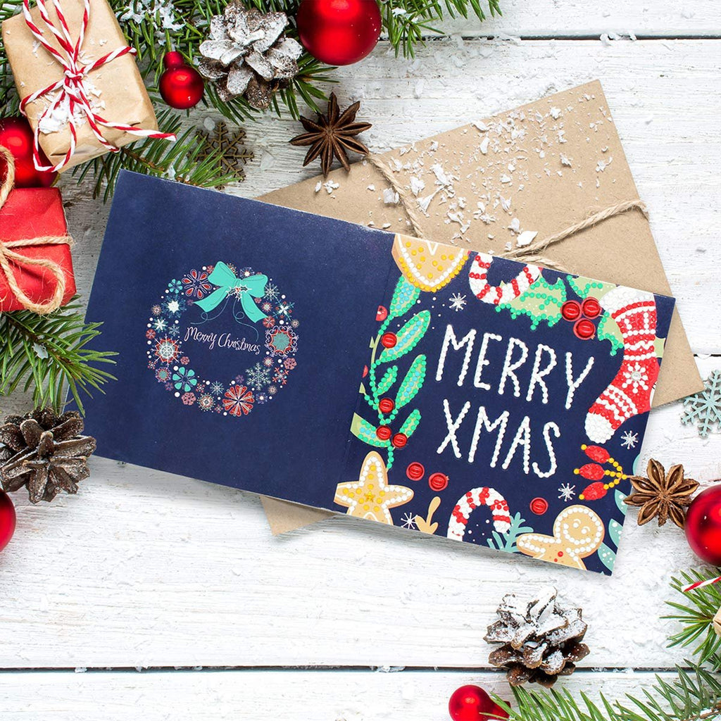 Diamond painting Christmas cards with envelopes, decorated with festive designs and text.