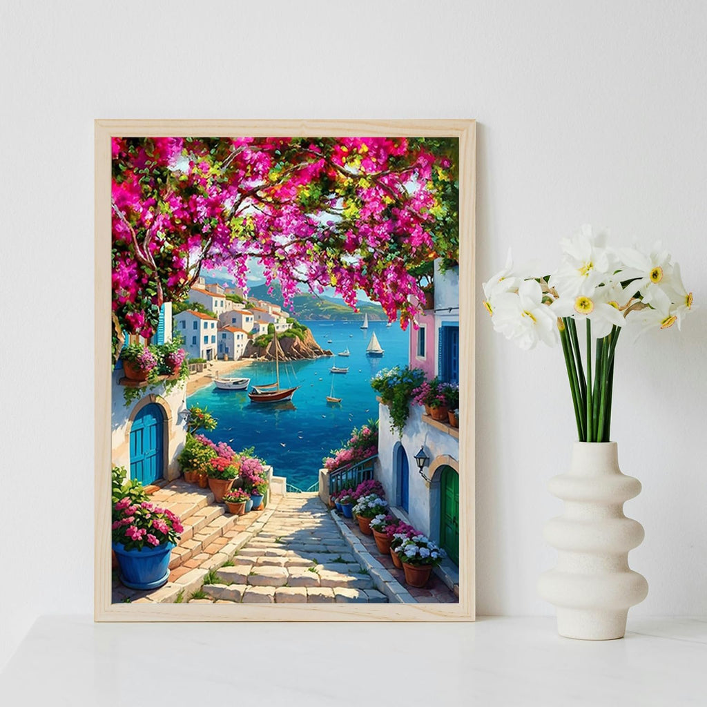 Paint by numbers canvas depicting a Mediterranean village with blooming flowers and boats on the sea.