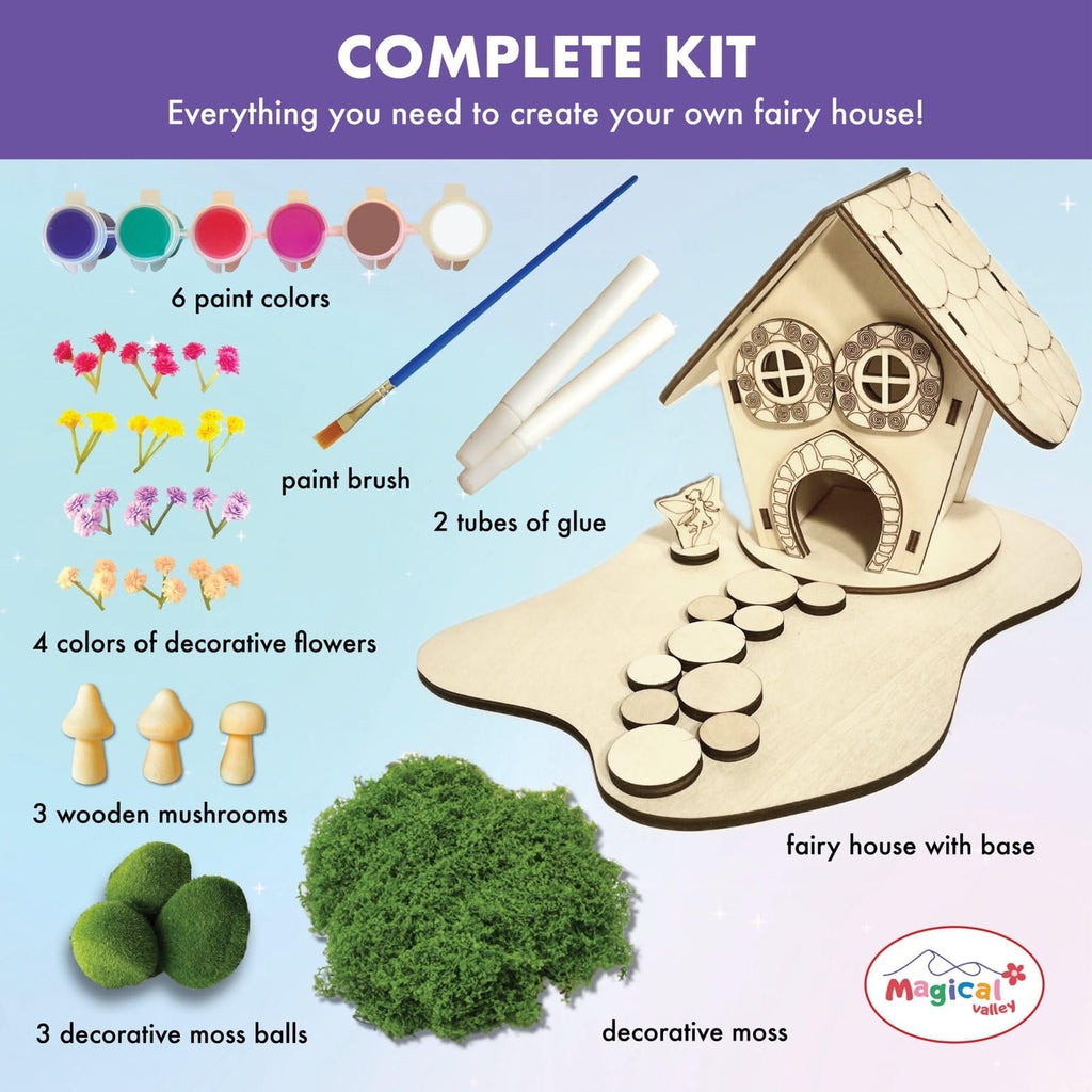 DIY wooden fairy house craft kit contents including paints, brush, glue, moss, flowers, mushrooms, and base.