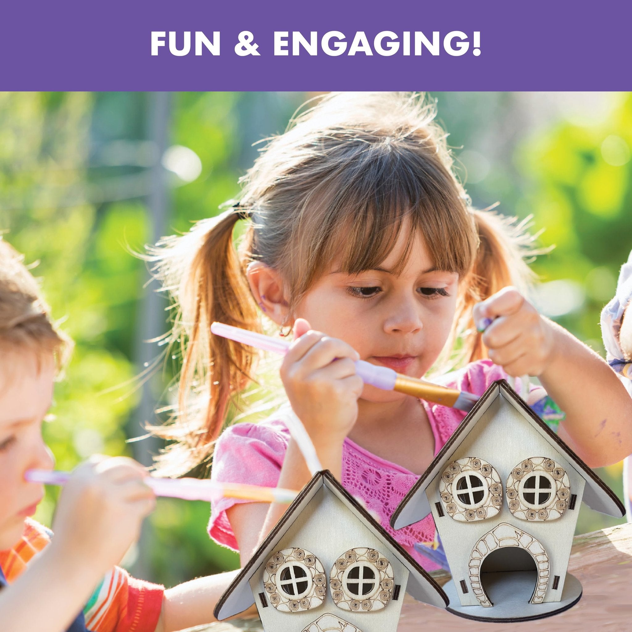 Two children painting wooden fairy houses outdoors, with a purple banner at the top reading 'FUN & ENGAGING!'