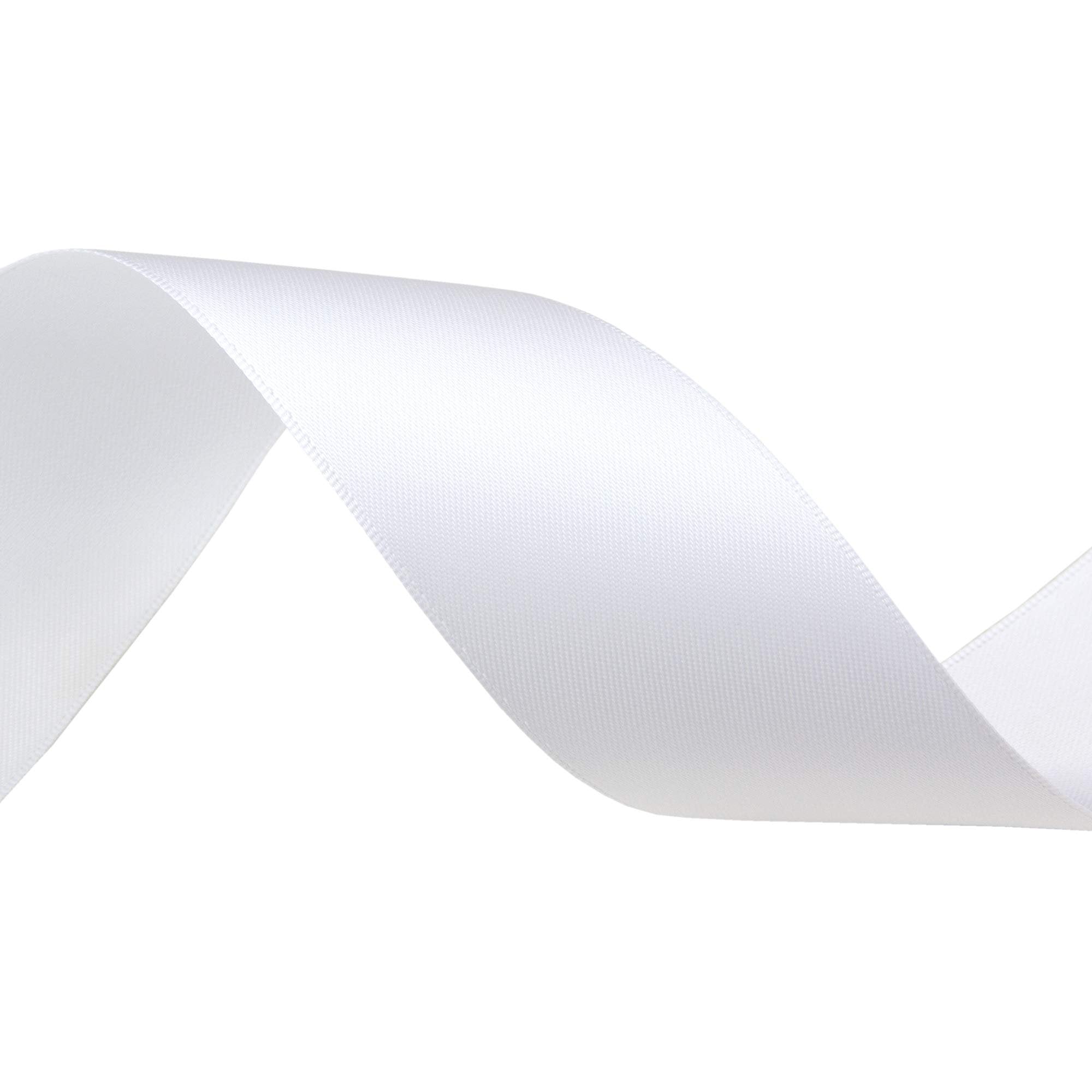 White satin ribbon curled on a white background, showing texture and sheen.