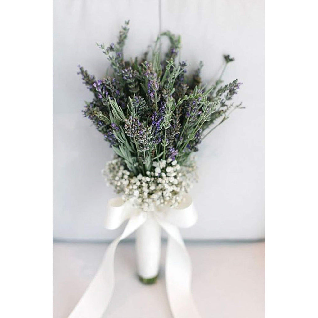 Lavender and baby's breath bouquet tied with a white satin ribbon bow