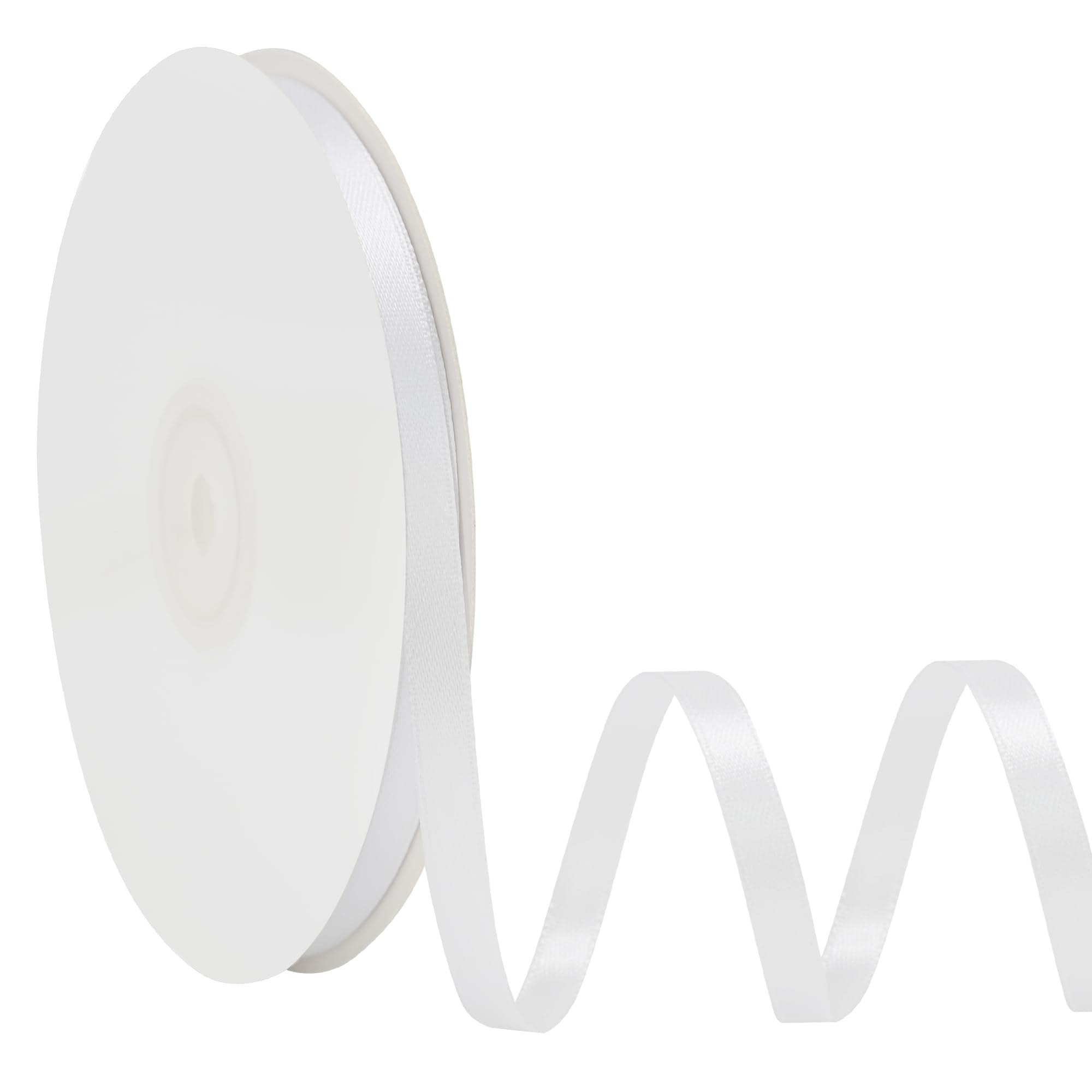 White satin ribbon on a spool with a wavy tail against a white background