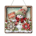 Diamond art snowman ornament with 'Welcome to our Home' sign, poinsettias, and snow details.