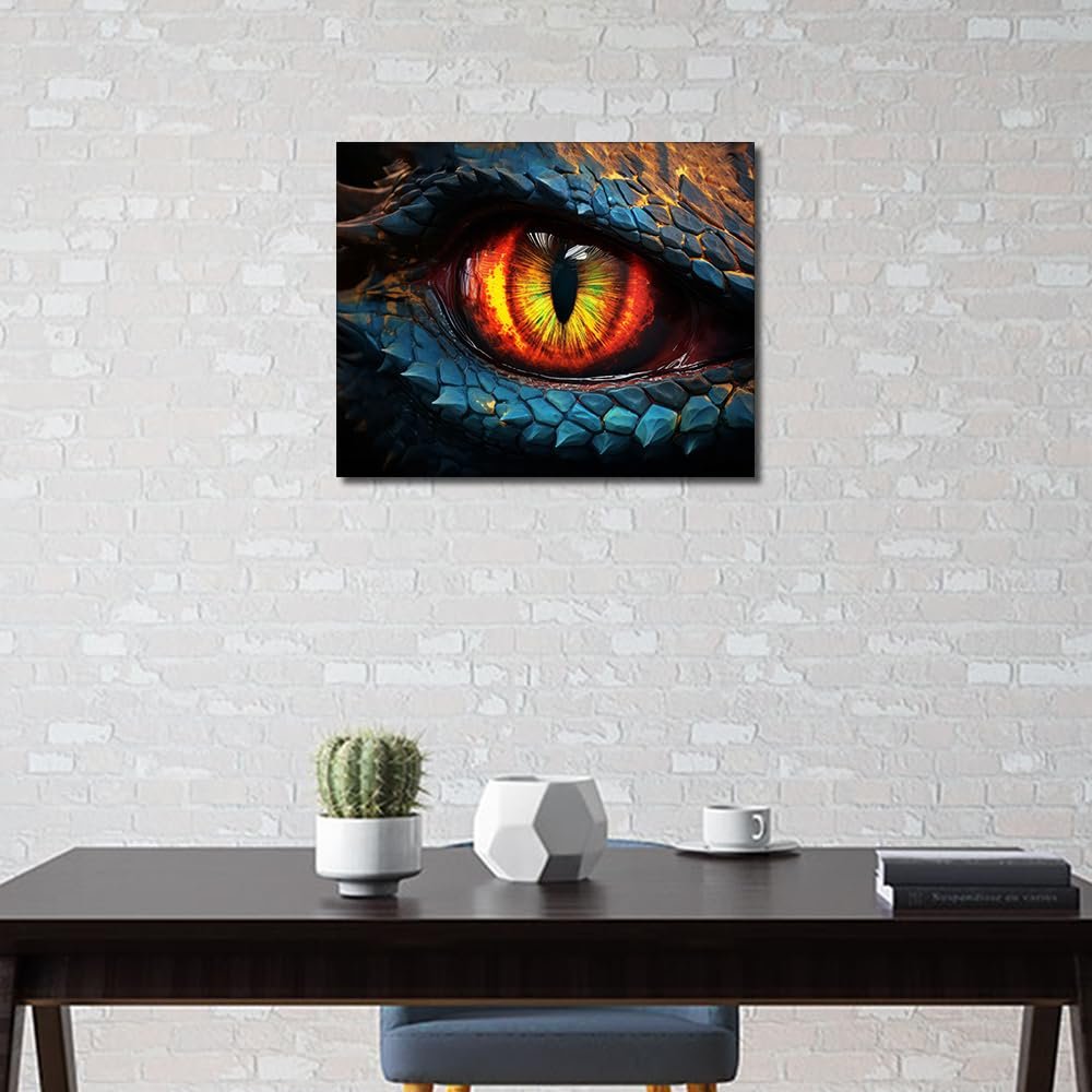 Close-up of a dragon's eye with vibrant orange and yellow iris, set against blue and gold scales, displayed on a wall above a table.