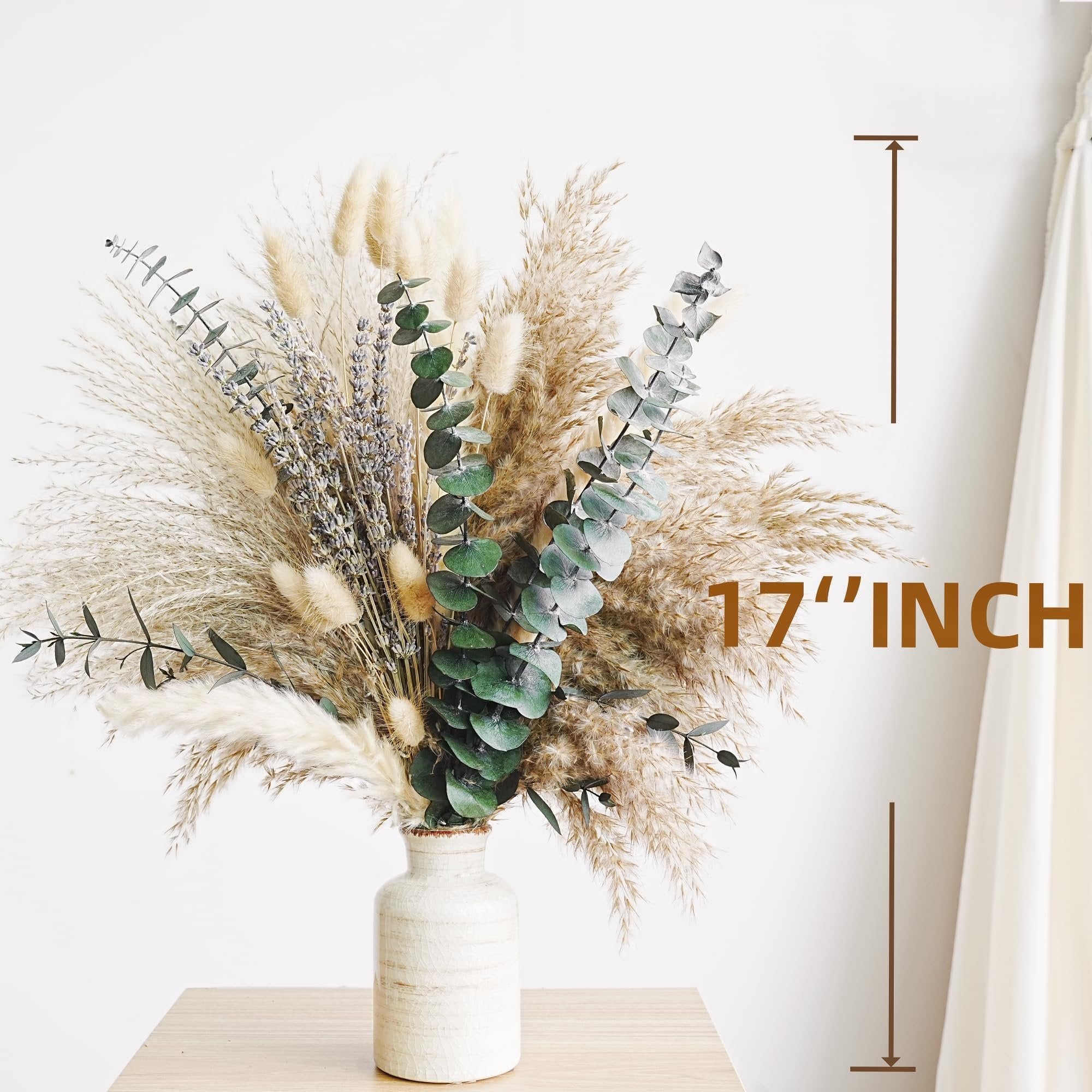 Dried boho flower bouquet with pampas grass, lavender, eucalyptus, and rabbit tail in a vase on a table, with a height indicator.